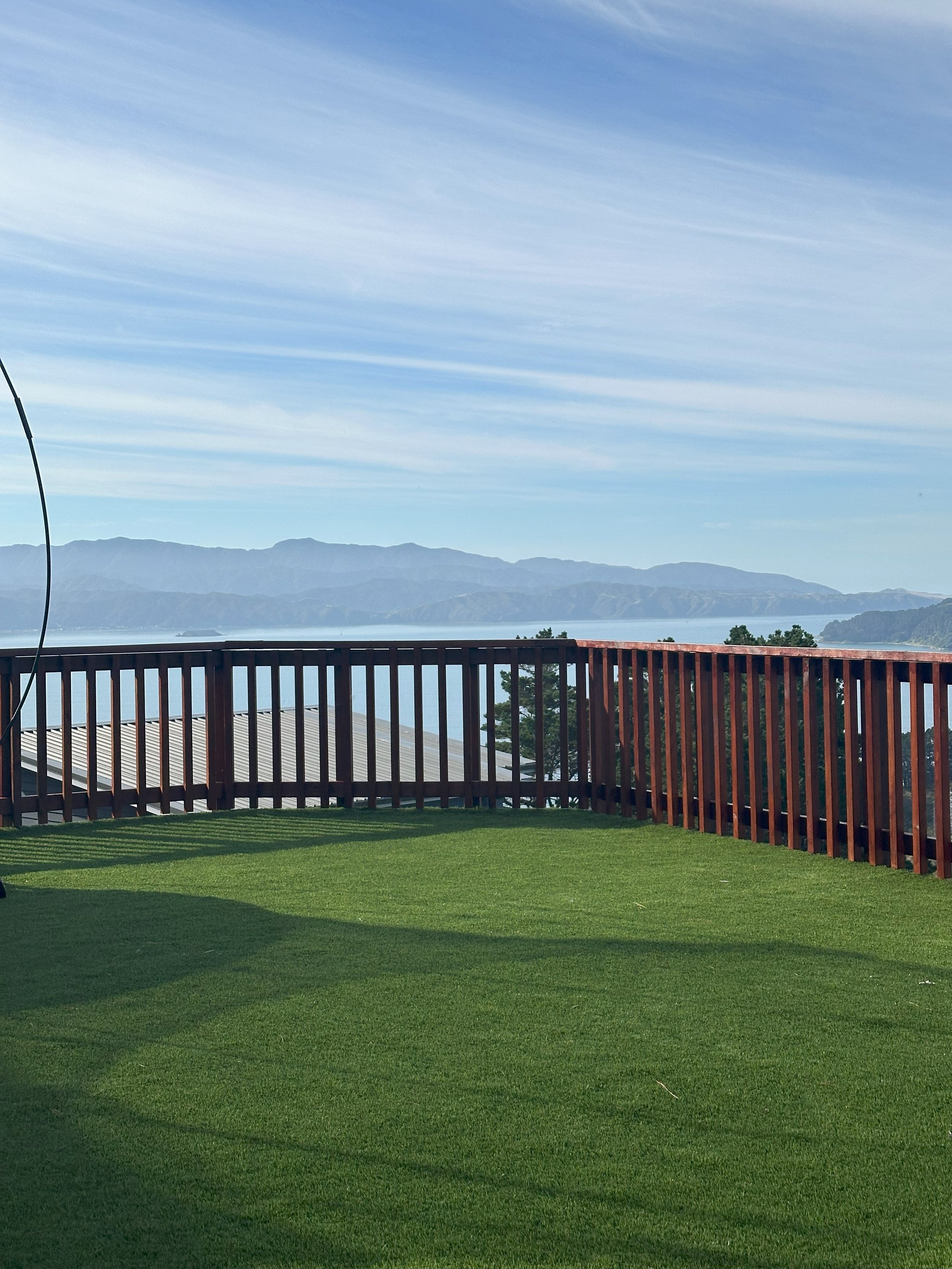Close-up of a perfect, lush green artificial turf lawn.