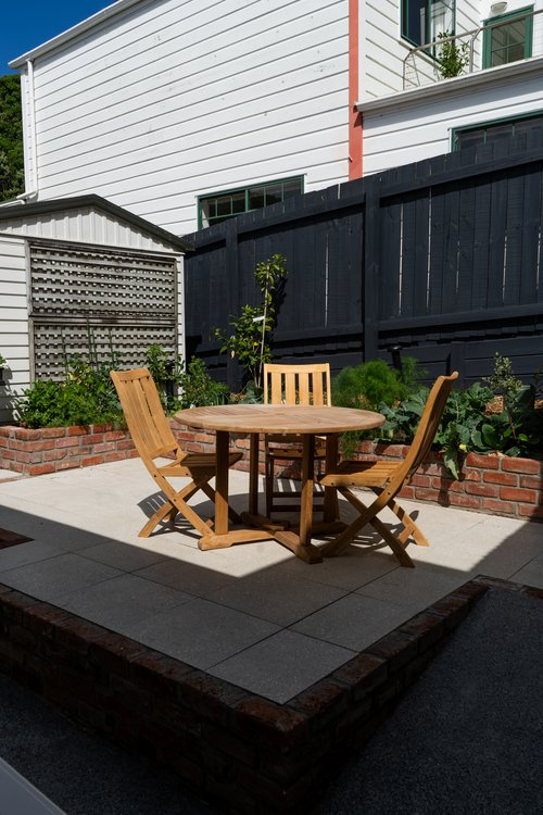 Potted edible herbs in a sunny spot