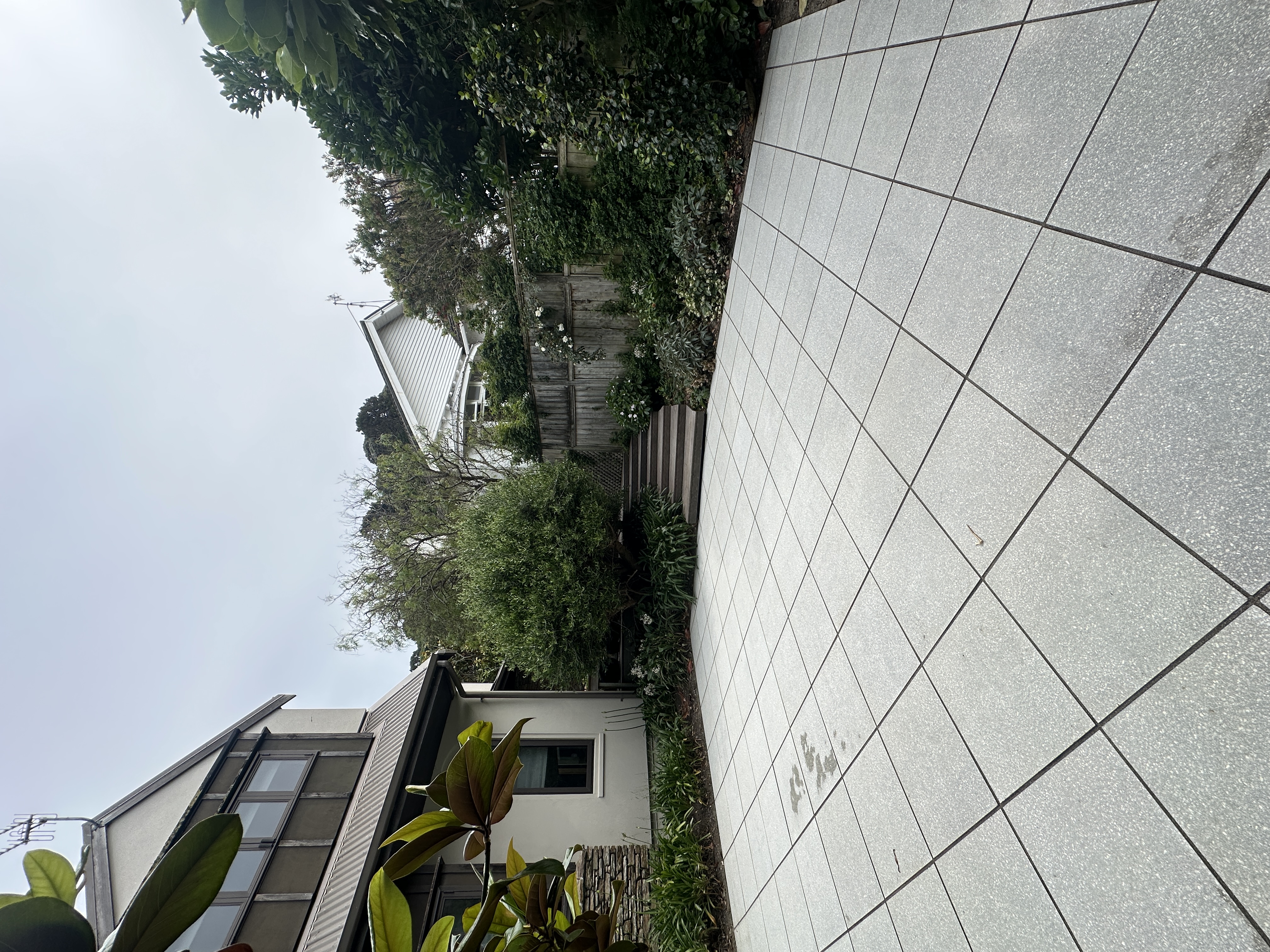 Beautifully crafted stone paving patio in a Wellington garden.